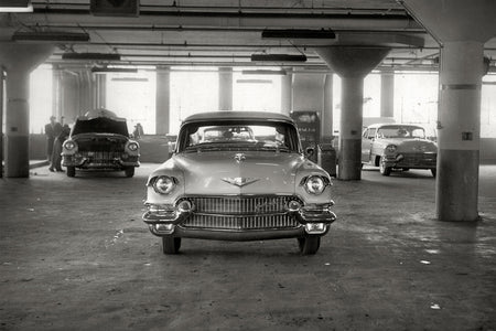 Cadillac on Display in Parking Garage (1955)